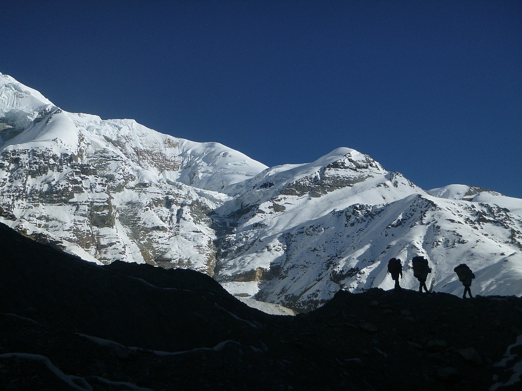Porters above glacier camp