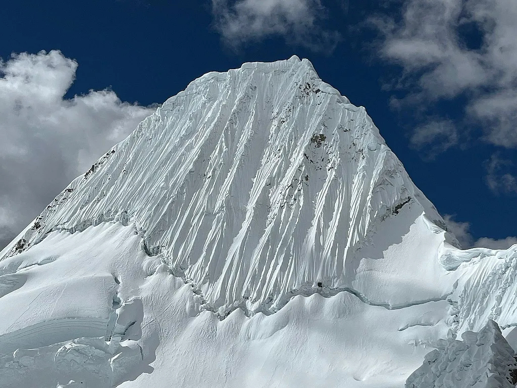 Alpamayo in June 2026. Teams climbed the French-Basque route to the left of the French-Direct
